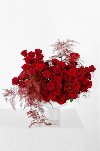 Red roses with red asparagus in white Fiber glass