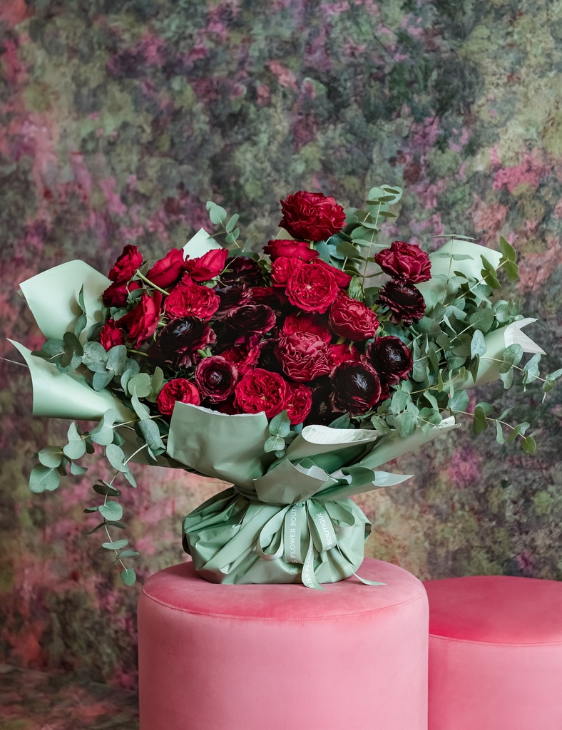 Red roses and peony burgundy with eucalyptus